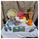 Garden tools and accessories including planters, bird feeders, and garden tools