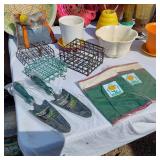 Garden tools and accessories including planters, bird feeders, and garden tools