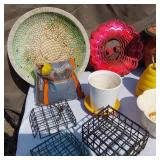 Garden tools and accessories including planters, bird feeders, and garden tools