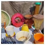 Garden tools and accessories including planters, bird feeders, and garden tools
