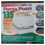 Thetford Porta Potti 135 Fresh Water Flush Portable Toilet, Coleman Lanterns, and Tent Poles