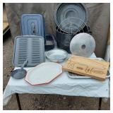 Kitchenware Collection including Enamelware Pots, Pans, and Cutting Board
