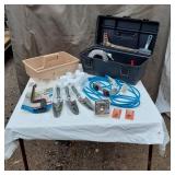 Assorted Tools and Hardware Bundle including Clear Vinyl Tubing, Deck Plan Bracket, and PVC Elbows