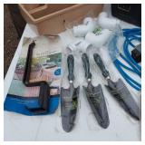 Assorted Tools and Hardware Bundle including Clear Vinyl Tubing, Deck Plan Bracket, and PVC Elbows