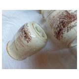 Vintage ceramic salt and pepper shakers with farm scene design