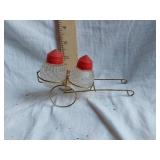 Salt and Pepper Shaker Set with Red Caps in Cart