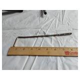 Assorted Plumbing Supplies and Tools including Drill Powered Drain Auger, Toilet Seat, and Various Fittings