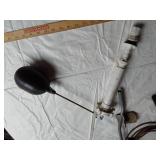 Assorted Plumbing Supplies and Tools including Drill Powered Drain Auger, Toilet Seat, and Various Fittings