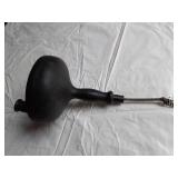 Assorted Plumbing Supplies and Tools including Drill Powered Drain Auger, Toilet Seat, and Various Fittings