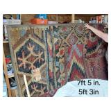 Woven Rug with Geometric Patterns approximately 7 feet 5 inches by 5 feet 3 inches