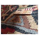 Woven Rug with Geometric Patterns approximately 7 feet 5 inches by 5 feet 3 inches