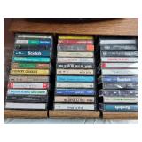 Braytonic TV, Sanyo VCR, and Audio/Video Media Collection including Cassettes and VHS Tapes