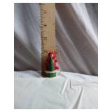 Decorative Items including Ceramic Figurine, Glass Jars, and Candle Holder