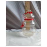 Decorative Items including Ceramic Figurine, Glass Jars, and Candle Holder