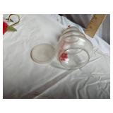 Decorative Items including Ceramic Figurine, Glass Jars, and Candle Holder