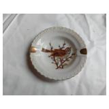 Collectible Plates and Figurines includingTilso Donkey (broken), South Dakota Plate, Texas Saucer, and Animal Figurines