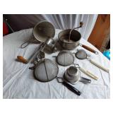 Kitchen tools including Foley Food Mill, Keystone Grinder, and strainers