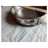 Vintage Kitchenware Lot including Metal Ice Cube Tray, Springform Pan, and Measuring Cup