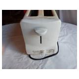 White Mountain Apple Peeler, Sunbeam Iron, Proctor-Silex Toaster, and General Electric Wall Clock