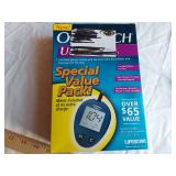 Various Household and Personal Items Including OneTouch Ultra Glucose Meter, Tools, and Accessories