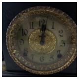 Antique E. Ingraham Black Mantel Clock with Ornate Brass Details