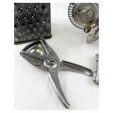 Vintage Kitchen Utensil Set with Grater, Egg Beater, and Wooden Salt & Pepper Shakers