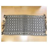Handwoven Black and White Patterned Area Rug with Fringe