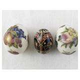 Collection of 3 Decorative Egg Figurines including The Egg Lady and Ukrainian Pysanka Style