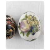 Collection of 3 Decorative Egg Figurines including The Egg Lady and Ukrainian Pysanka Style