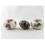 Collection of 3 Decorative Egg Figurines including The Egg Lady and Ukrainian Pysanka Style