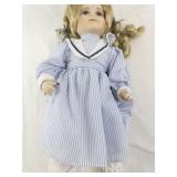 Genuine Porcelain Doll with Blonde Hair in Blue Striped Dress
