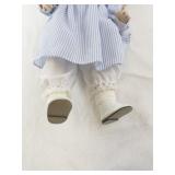 Genuine Porcelain Doll with Blonde Hair in Blue Striped Dress