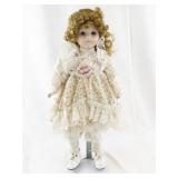 Sweetheart Collection Porcelain Doll with Curly Hair and Floral Dress