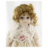 Sweetheart Collection Porcelain Doll with Curly Hair and Floral Dress