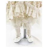 Sweetheart Collection Porcelain Doll with Curly Hair and Floral Dress