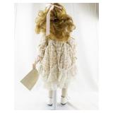 Sweetheart Collection Porcelain Doll with Curly Hair and Floral Dress