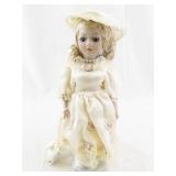 Porcelain Victorian-Style Doll with Lace Dress and Hat