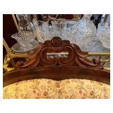 Antique Victorian-Style Sofa with Carved Wood Detail and Floral Upholstery