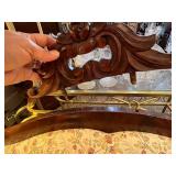 Antique Victorian-Style Sofa with Carved Wood Detail and Floral Upholstery