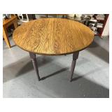 Extendable Wooden Dining Table with Painted Legs