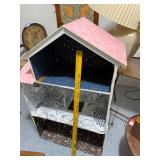 Charming Multi-Story Dollhouse with Decorative Interiors
