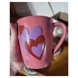 Decorative Pink Heart Mug, Amethyst Scented Candle, and Assorted Home Decor Items