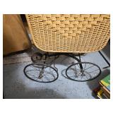 Vintage Wicker Baby Carriage with Intricate Weaving