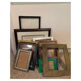 Collection of Assorted Picture Frames in Various Sizes and Styles