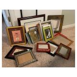 Collection of Assorted Picture Frames in Various Sizes and Styles
