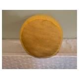 Yellow Fabric Ottoman and Green Sleeping Bag with Stuff Sack