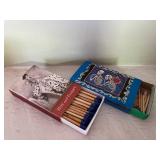 Eclectic Art and Decor Collection with Wall Plaque, Sculptures, Matches, and Vases
