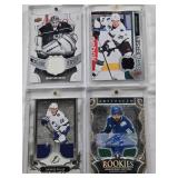 Logan Couture 2014-15 Upper Deck Game Jersey Patch, Arshdeep Bains 2024-25 Upper Deck Artifacts Rookies Auto Gold Materials Patch 11/49, Jonathan Quick 2018-19 Upper Deck Game Jersey Patch, Ondrej Pal