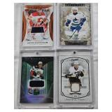 Conor Garland 2024-25 Upper Deck Artifacts Patch 170/299, Daniel Sprong 2015-16 Upper Deck Champs Rookie Relic, Jacob Markstrom 2022-23 Upper Deck Trilogy Black Patch, Maxime Comtois 2018-19 Upper Dec
