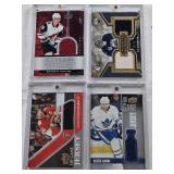 Ty Conklin 2005/06 SPx Winning Materials Jersey Patch 93/99, Nazem Kadri 2019-20 Upper Deck UD Game Jersey Patch, Barrett Hayton 2019-20 Trilogy Rookie Renditions Patch, Aleksander Barkov 2020-21 Uppe